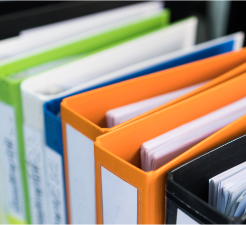 A row of colorful binders